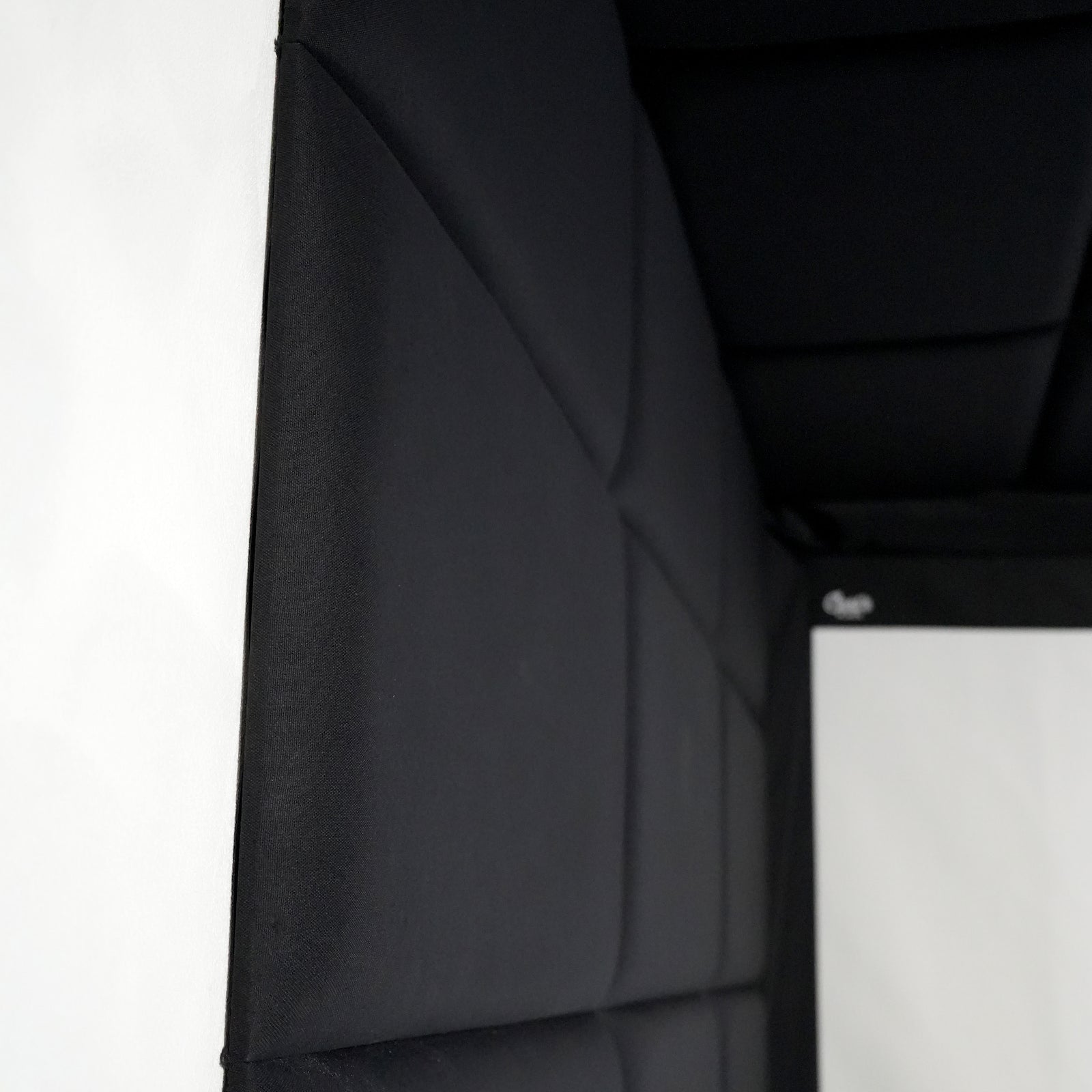 Padded wall panels in a built-in golf room