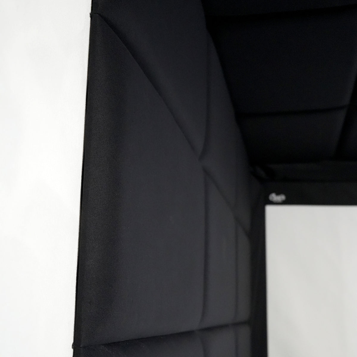 Padded wall panels in a Carl's Place Built-In golf room